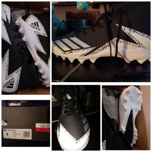 Brand new in box Football Cleats size 8